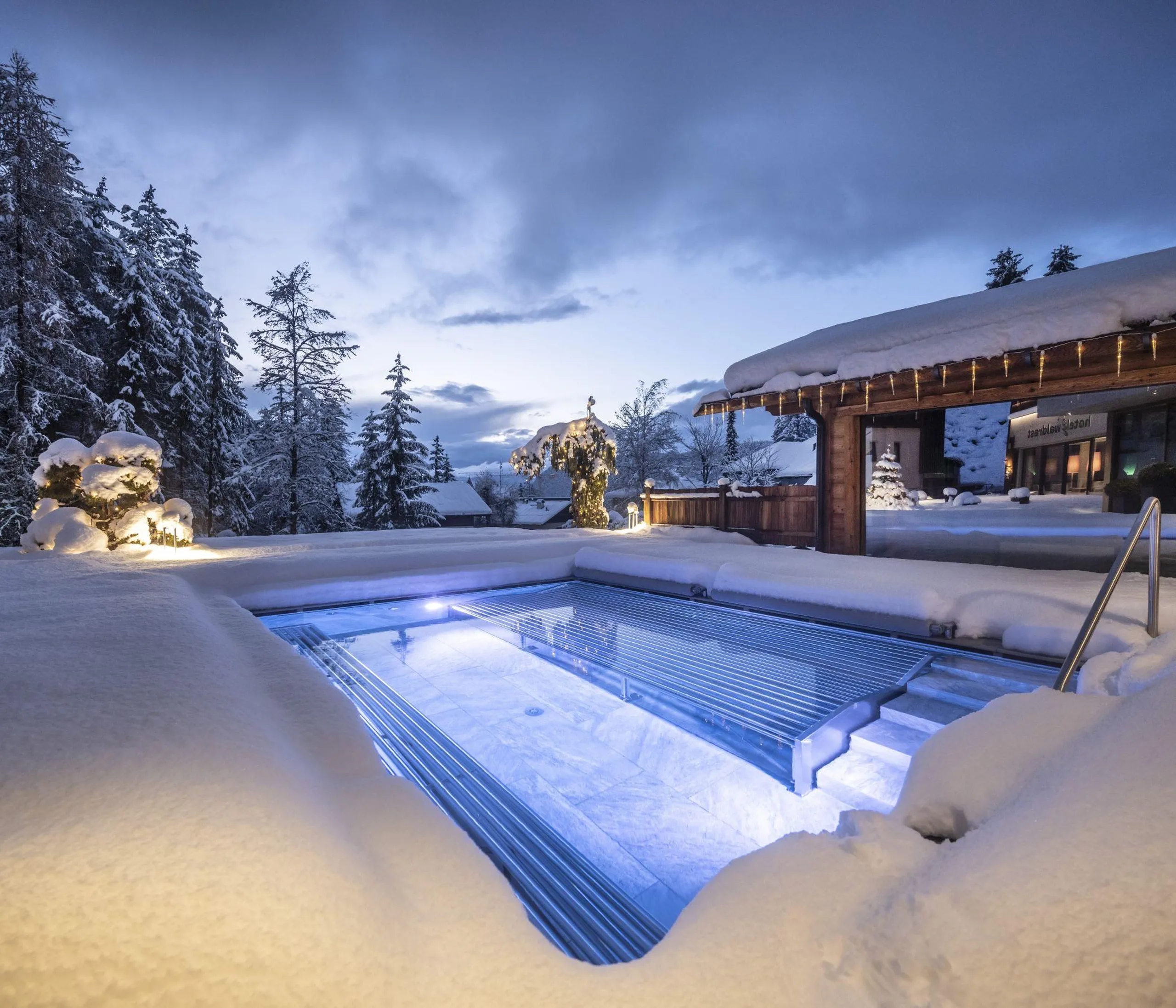 Outdoor pool on a winter evening